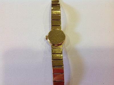 Lot 155 - Longines - a lady's yellow metal bracelet watch.