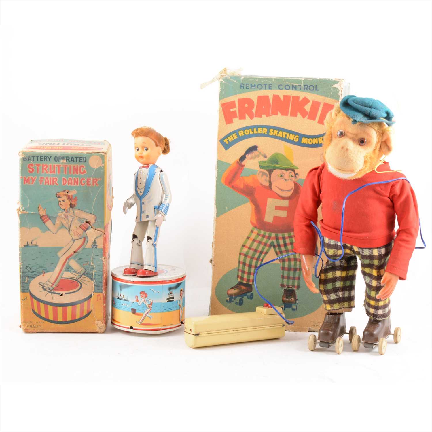 Lot 431 - Japanese Tin-plate battery operated toys; Haji Strutting 'My Fair Dancer' boxed, 28cm, and an Alps Frankie The Roller Skating Monkey, boxed, 32cm.