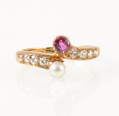Lot 29 - A pearl and diamond crossover ring.