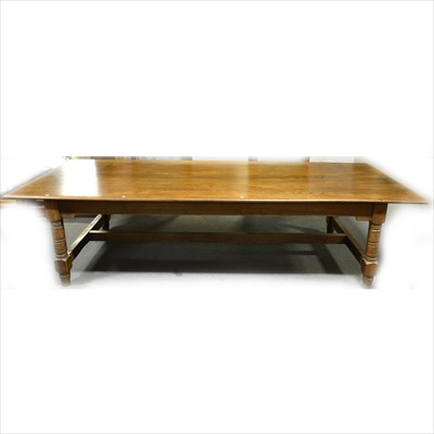 Lot 489 - A large elm estate-made  dining table