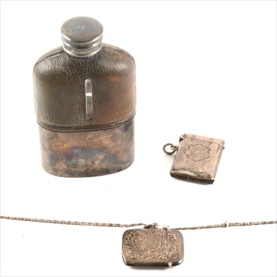 Lot 150A - Two silver vesta cases, and a leather-clad plated hip flask.