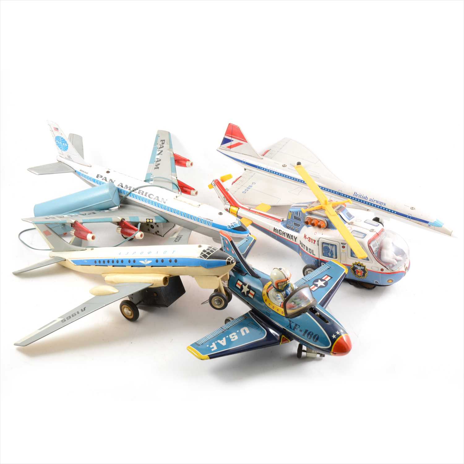 Lot 418 - Tin-plate toy aircraft; five including Louis Marx 'Pan American' Boeing, Nomura Japan XF-160 USAF aeroplane, etc