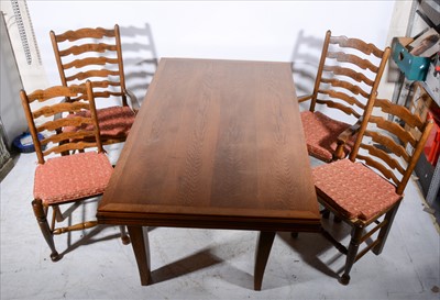 Lot 297 - An oak dining table, and six beech wavy-back dining chairs.