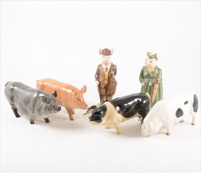 Lot 109 - Two Beswick figures, Gentleman Pig and Lady Pig, and other pig figures