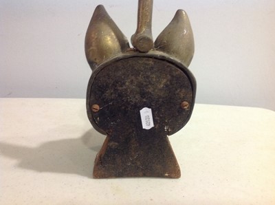 Lot 141 - A cast brass doorstop, modelled as a fox head and riding crop