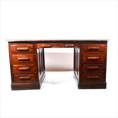 Lot 334 - An oak office desk