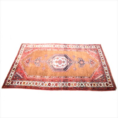 Lot 499 - An Iranian rug with central medallion