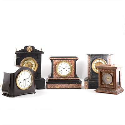 Lot 137 - A Victorian black marble mantel clock, and four other mantel clocks