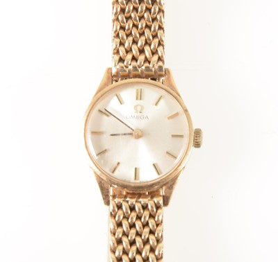Lot 152 - Omega - a lady's 9 carat yellow gold bracelet watch.