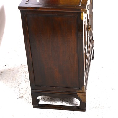 Lot 73 - A small Korean elm and stained wood cabinet