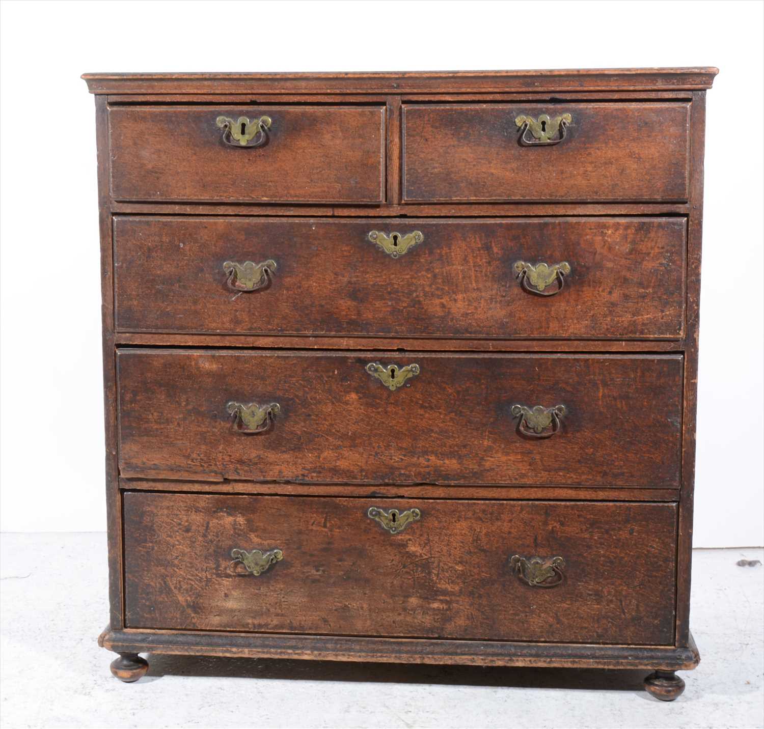 Lot 452 - George III oak chest of drawers