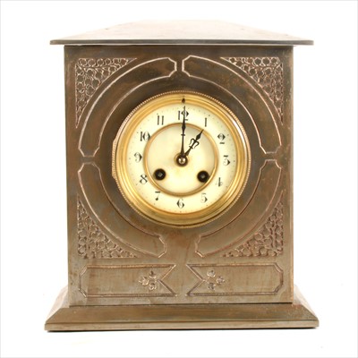Lot 183 - A steel plated mantel clock