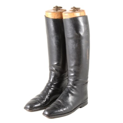 Lot 156 - A pair of black leather hunting boots, sized 10, with wooden trees.