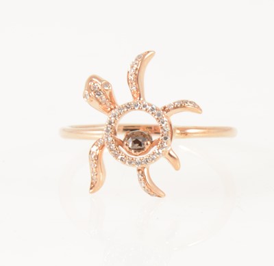 Lot 1258 - A diamond set "Floating Turtle" ring.