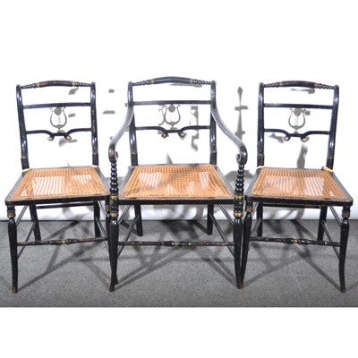 Lot 611 - Three Regency pattern ebonised dining chairs