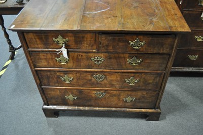 Lot 299 - A George II walnut chest of drawers