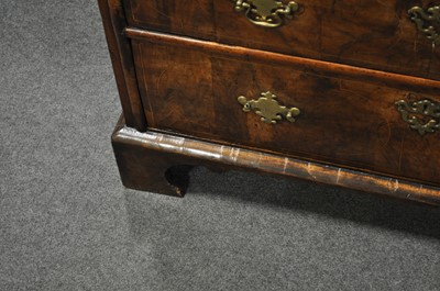 Lot 299 - A George II walnut chest of drawers