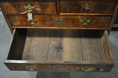 Lot 299 - A George II walnut chest of drawers