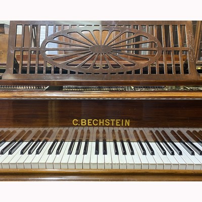 Lot 270 - A German rosewood and simulated rosewood cased grand piano