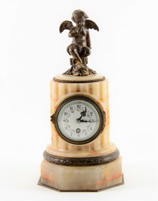 Lot 146 - A Louis XVI style russet grained onyx and gilt metal mounted plinth clock, French, circa 1900