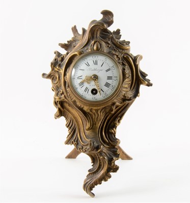 Lot 214 - A Rococo style gilt metal strut clock, signed Balthazar à Paris