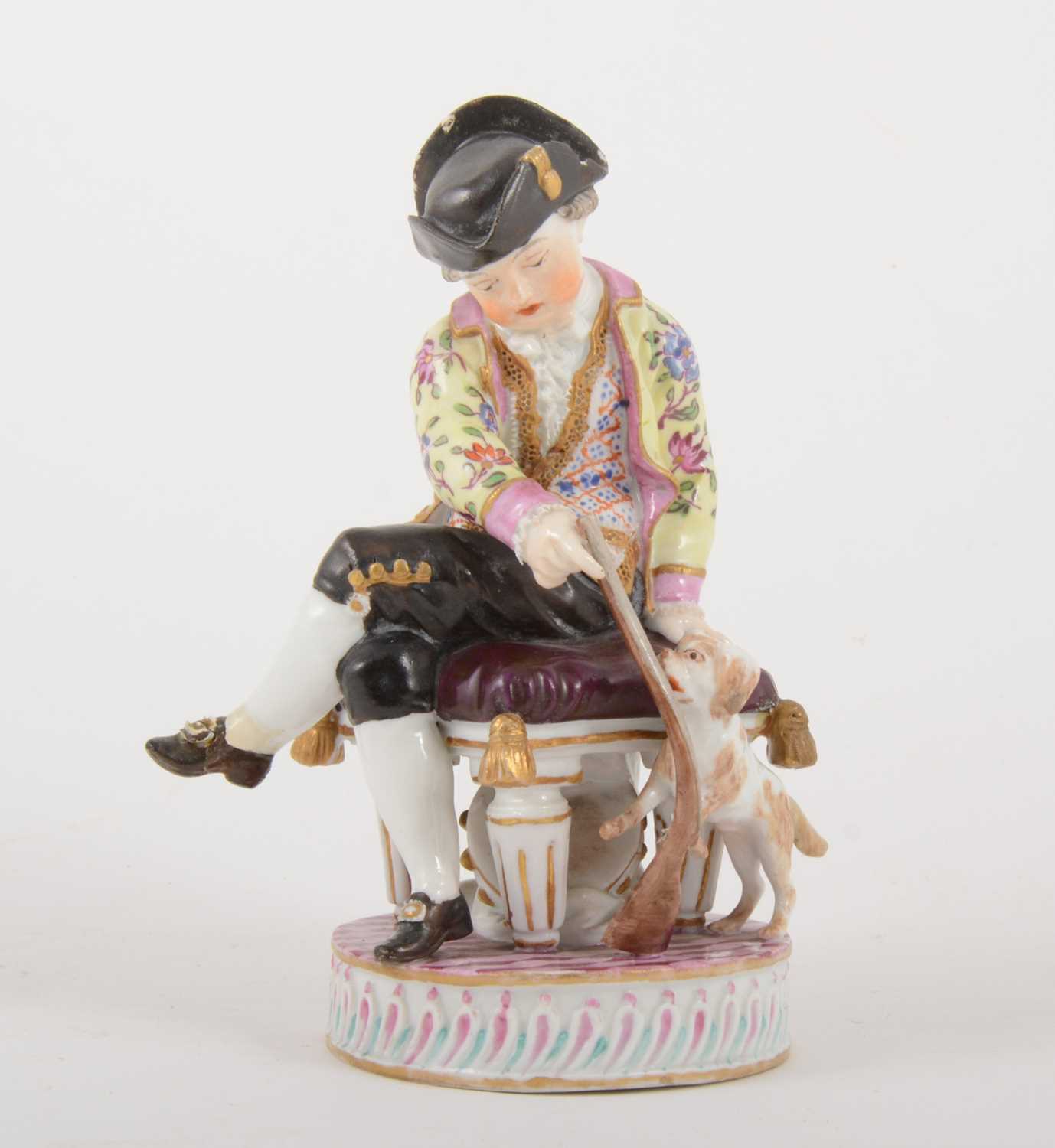 Lot 24 - A Meissen porcelain figure of a boy with a puppy