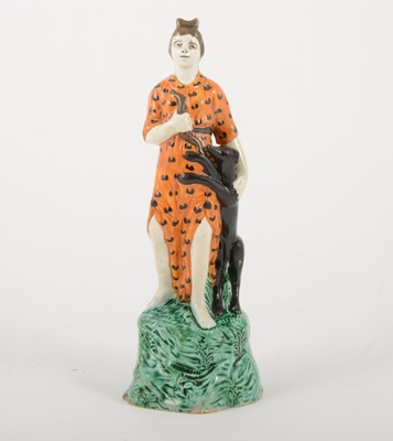Lot 3 - A Staffordshire lead-glazed earthenware figure