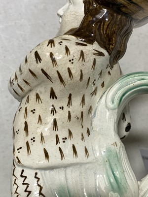 Lot 13 - A Pearlware type earthenware 'Hearty Goodfellow' Toby jug, early 19th centur