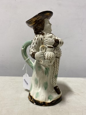Lot 13 - A Pearlware type earthenware 'Hearty Goodfellow' Toby jug, early 19th centur