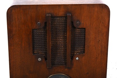 Lot 61 - Lissen valve radio in stained oak ply case, serial number LN8113 10982, fitted valves, Magnavox speaker, 47cm tall.