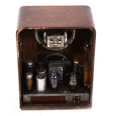 Lot 61 - Lissen valve radio in stained oak ply case, serial number LN8113 10982, fitted valves, Magnavox speaker, 47cm tall.