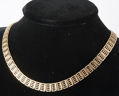 Lot 1326 - A 9 carat yellow gold five bar gate link necklace.