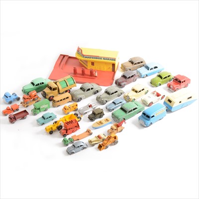 Lot 125 - Dinky and Matchbox Toys; a selection of loose examples, and a Matchbox garage with petrol pumps.