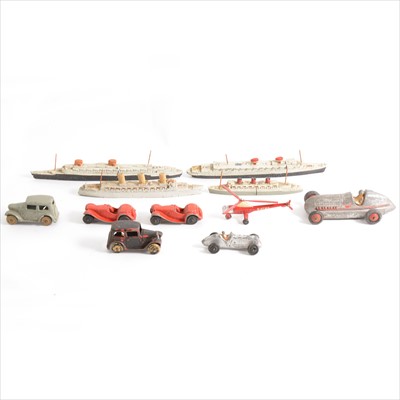 Lot 124 - Dinky Toys; eleven early loose examples including no.35 red sports car (x2), No.716 Westland-Sikorsky, racing cars, and boats.