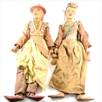 Lot 133 - Two Indonesian puppets.