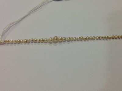 Lot 345 - A pearl necklace with diamond set clasp.