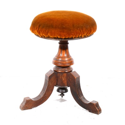 Lot 355 - A Victorian walnut piano stool