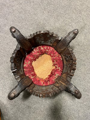 Lot 476 - A Burmese carved teak wood footstool