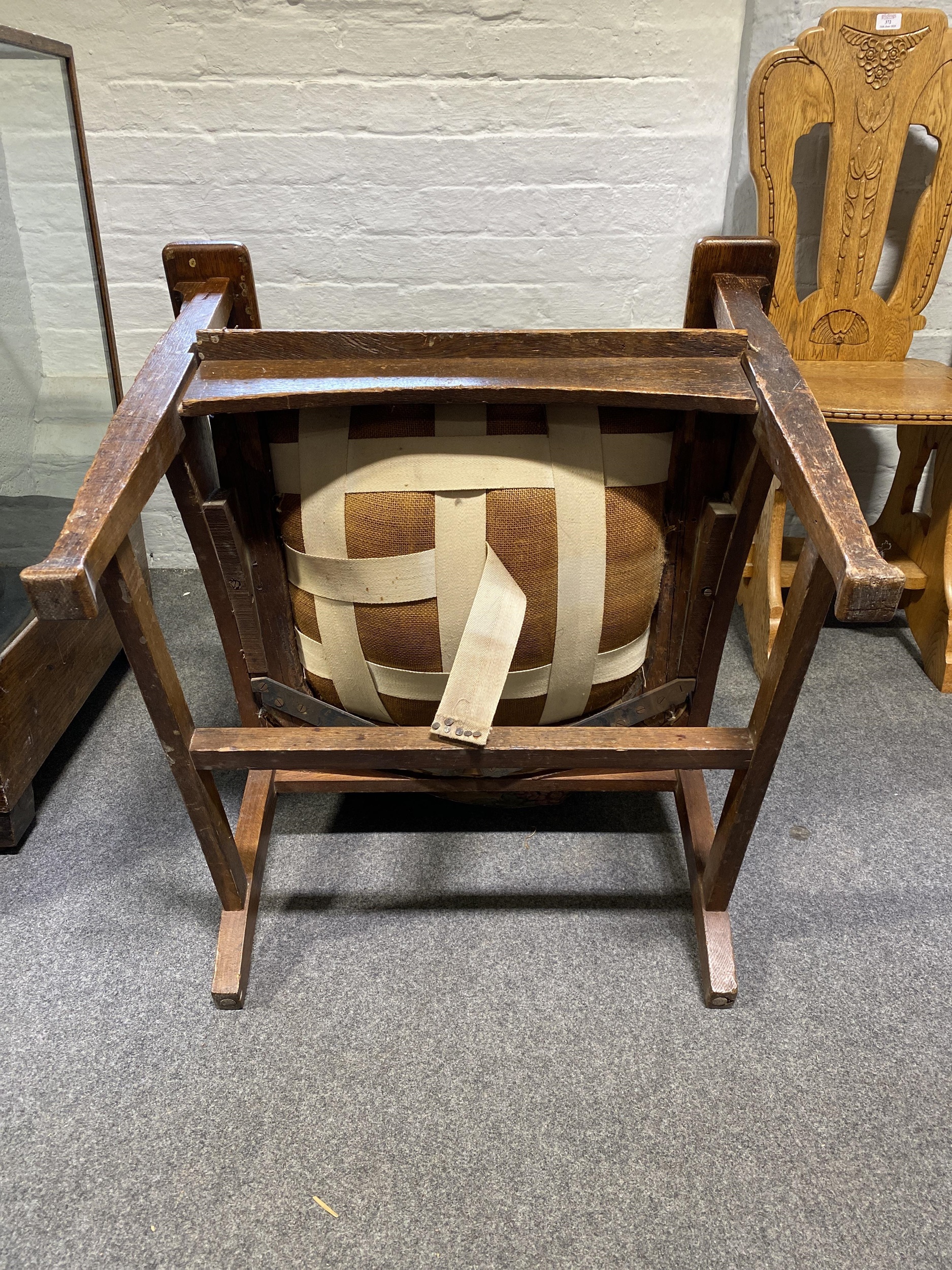 Lot 364 - An Edwardian oak easychair