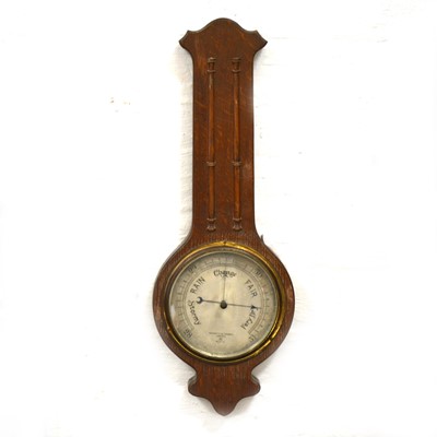 Lot 403 - A 1930s oak cased banjo barometer, signed Negretti & Zambra