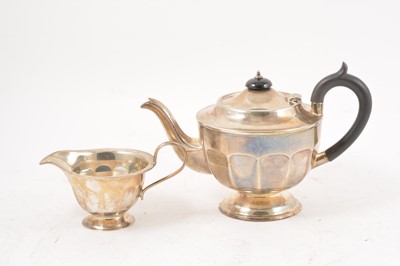 Lot 283 - Silver teapot and milk jug