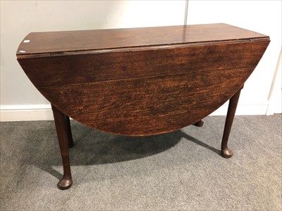 Lot 314 - An old oak drop-leaf table