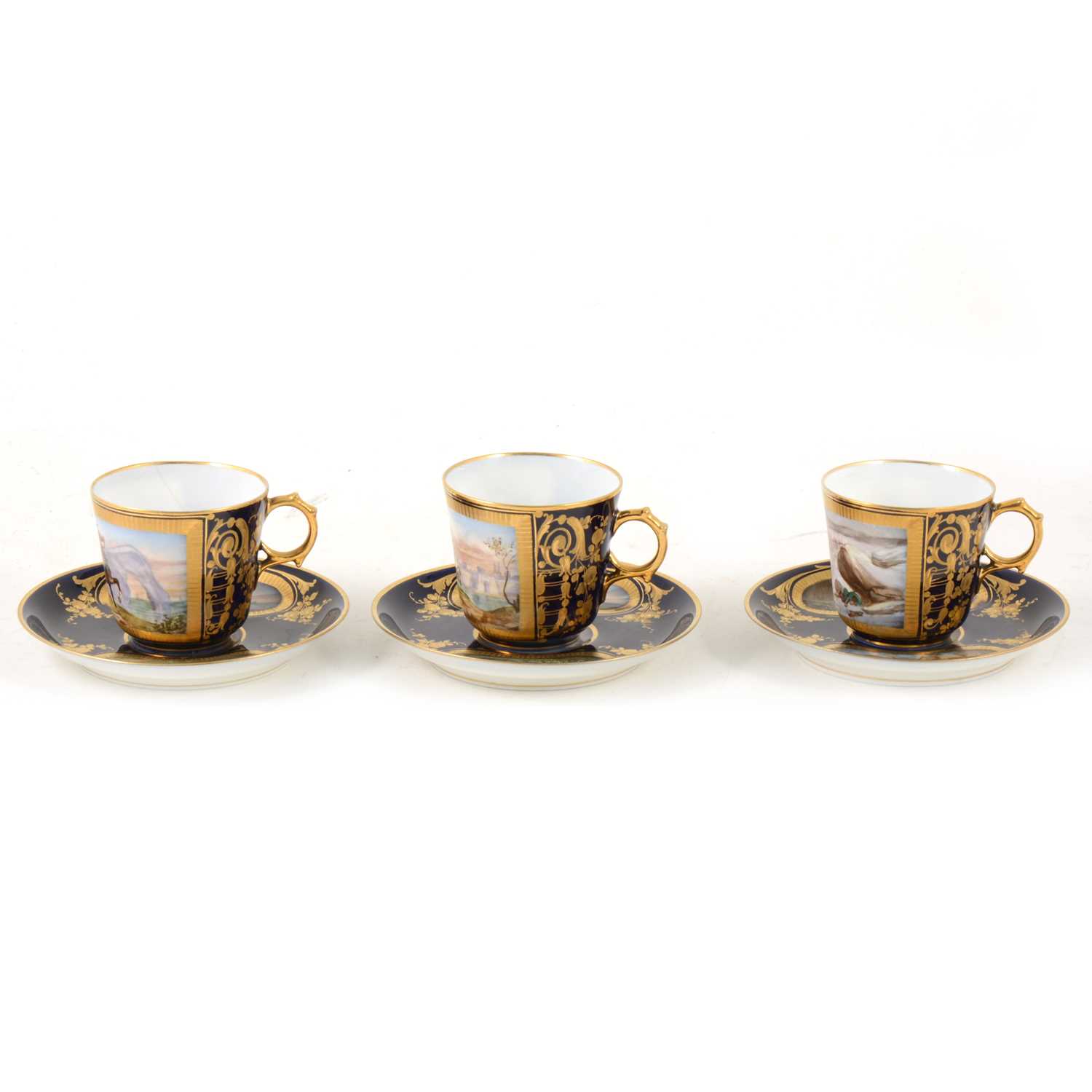 Lot 1003 - Three Sevres porcelain cabinet cups and saucers
