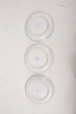 Lot 1003 - Three Sevres porcelain cabinet cups and saucers