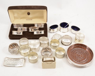 Lot 1173 - A collection of silver and plated collectables, napkin rings, vesta, salts.