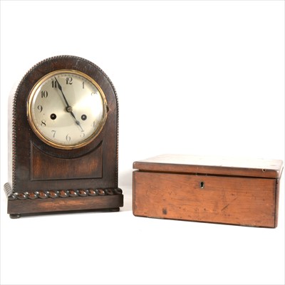 Lot 131 - An oak cased mantel clock and a stained wood slide box
