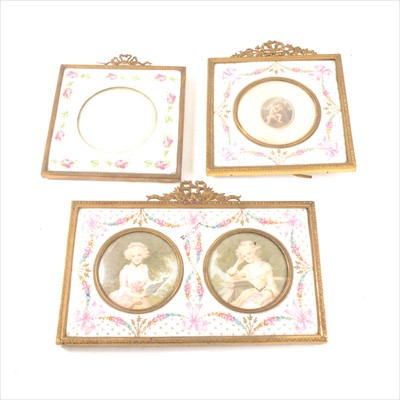 Lot 225 - A porcelain faced gilt metal twin-picture frame, and two similar single frames