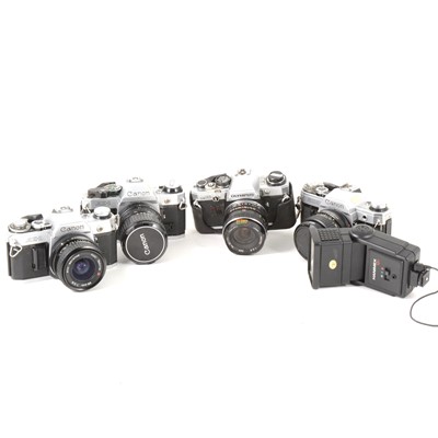 Lot 120 - Three Canon AE-1 35mm SLR cameras, and others, one box.