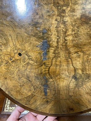 Lot 83 - A Victorian figured walnut Sutherland table