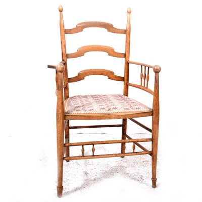 Lot 86 - An Arts & Crafts style stained beechwood ladder-back dining chair